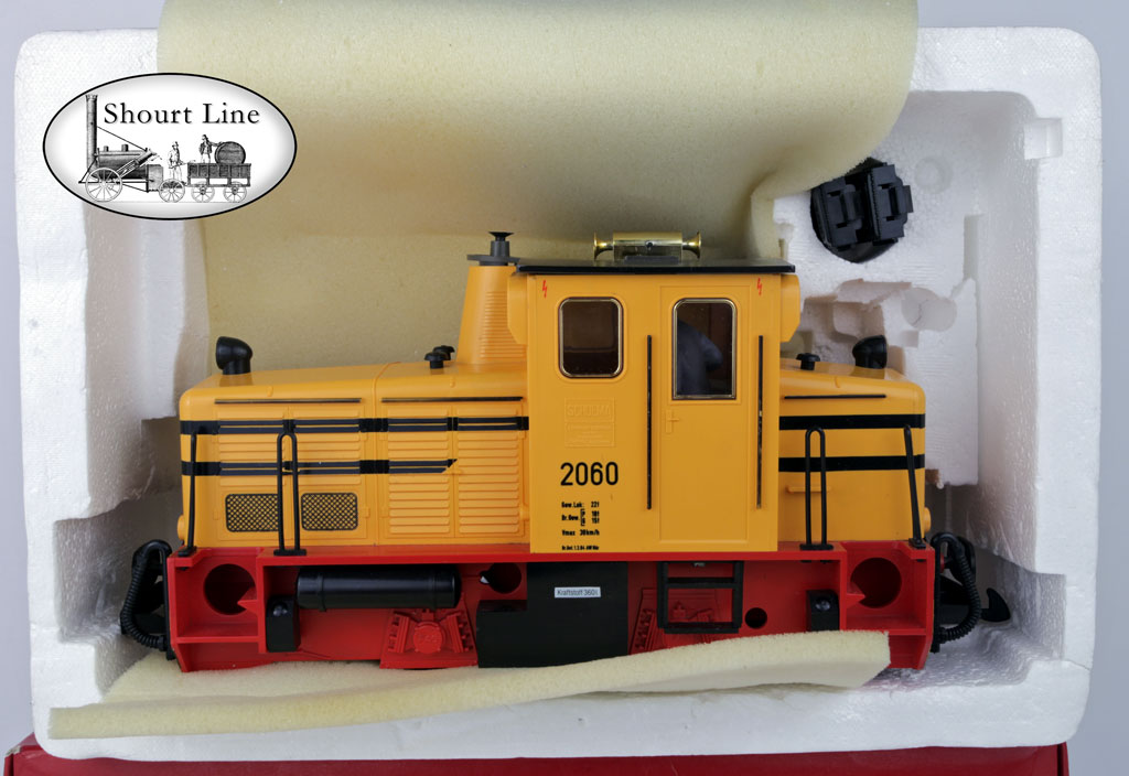 LGB 2060H Schoema Diesel Switcher Locomotive Yellow, Horn Sound, Lights + 2 Track Magnets NEW box top off showing loco in foam carrier with packing and 2 track magnets in the box