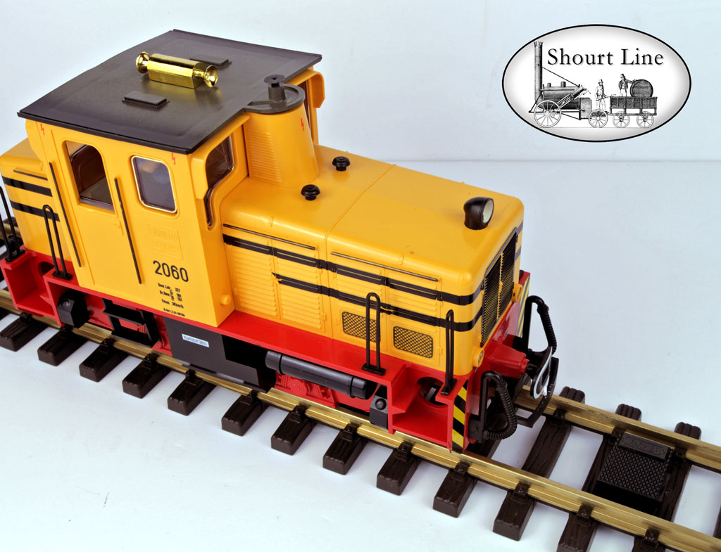 LGB 2060H Schoema Diesel Switcher Locomotive Yellow Horn Lights + 2ea Tk Magnets NEW on track showing one of the two track magnets set on the track to trigger the loco when it passes over the magnet