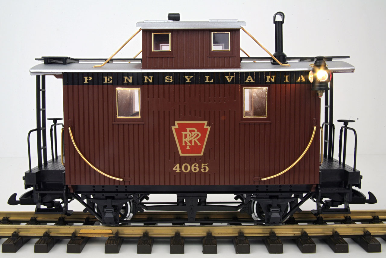 Pennsylvania Rail Road Caboose with Metal wheels, track powered interior and exterior lighting