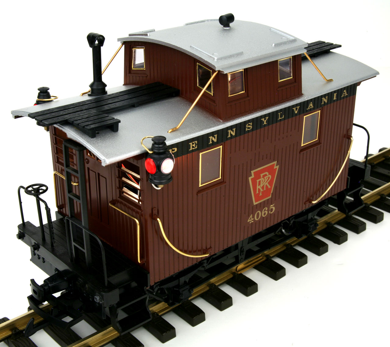Pennsylvania Rail Road Caboose with Metal wheels, track powered interior and exterior lighting