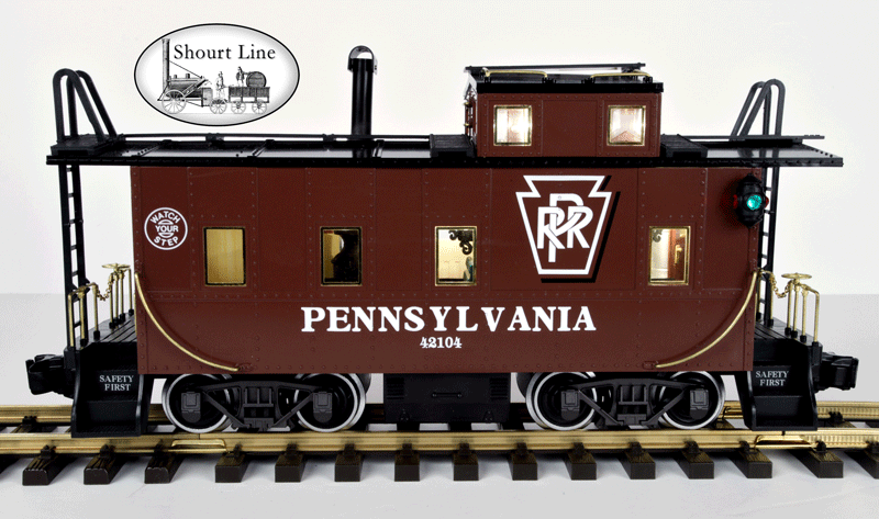 G Scale REA 12104 PENN SMOKING Lighted Drovers Caboose - Metal Wheels - Knuckle & LGB type Hook and Loop couplers side view with full lighting by track power left side